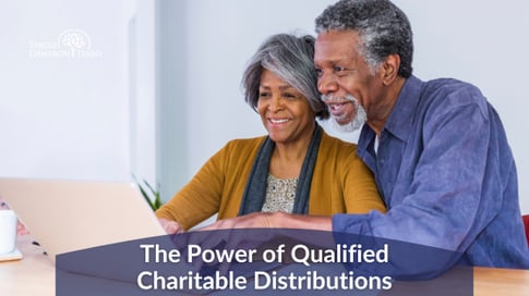 Couple reviewing how a Qualified Charitable Distribution moves funds from an IRA directly to a charity